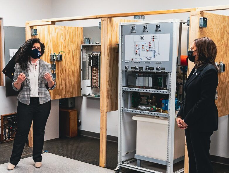 Haley Kamberalis and Kamala Harris having a discussion