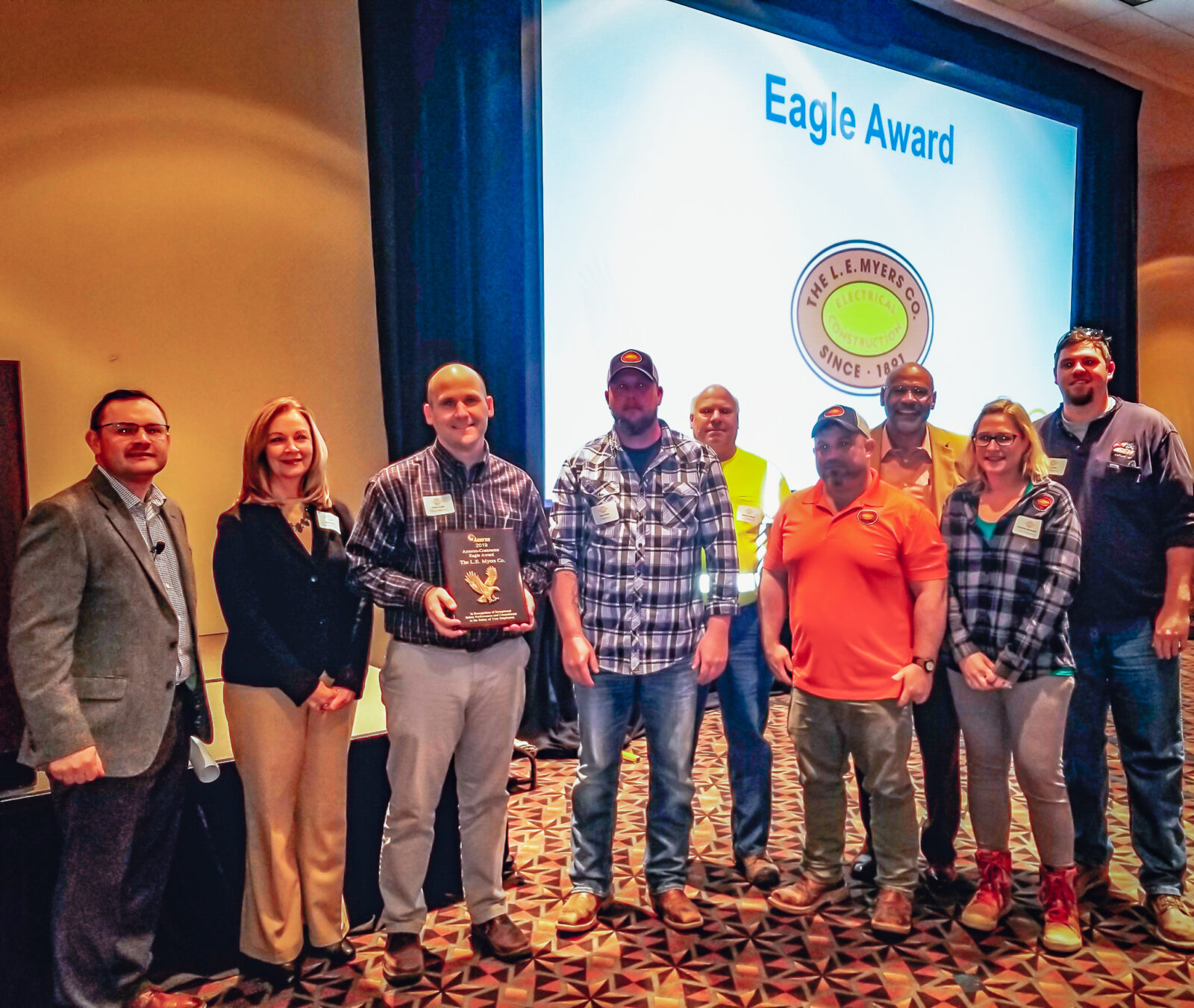 MYR team accepting the eagle award