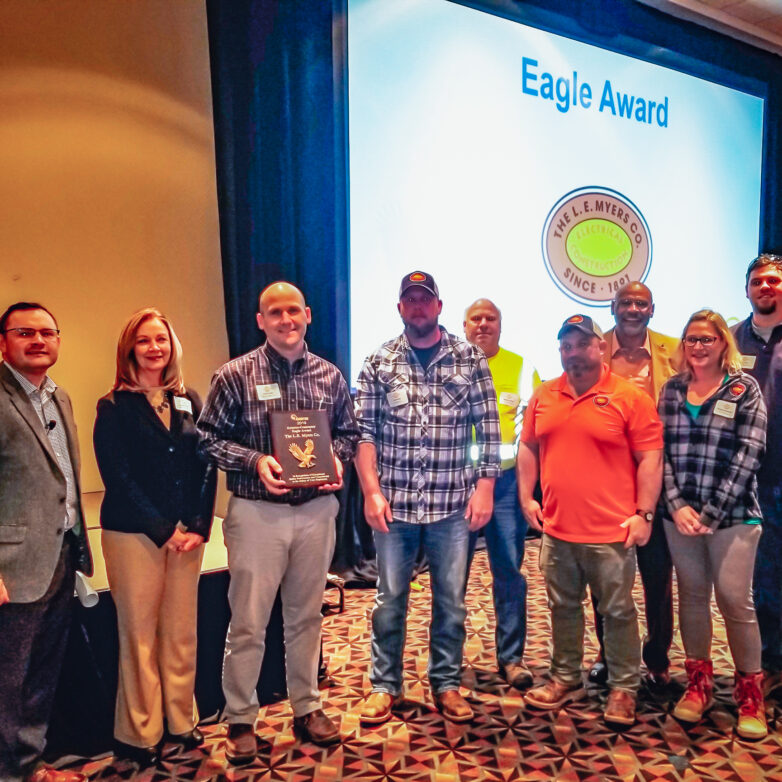 MYR team accepting the eagle award
