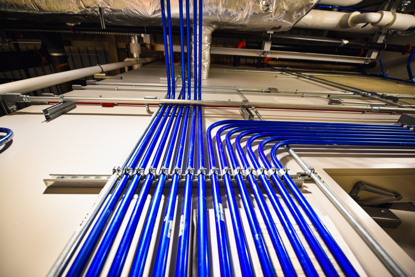 Blue power lines installed on a wall