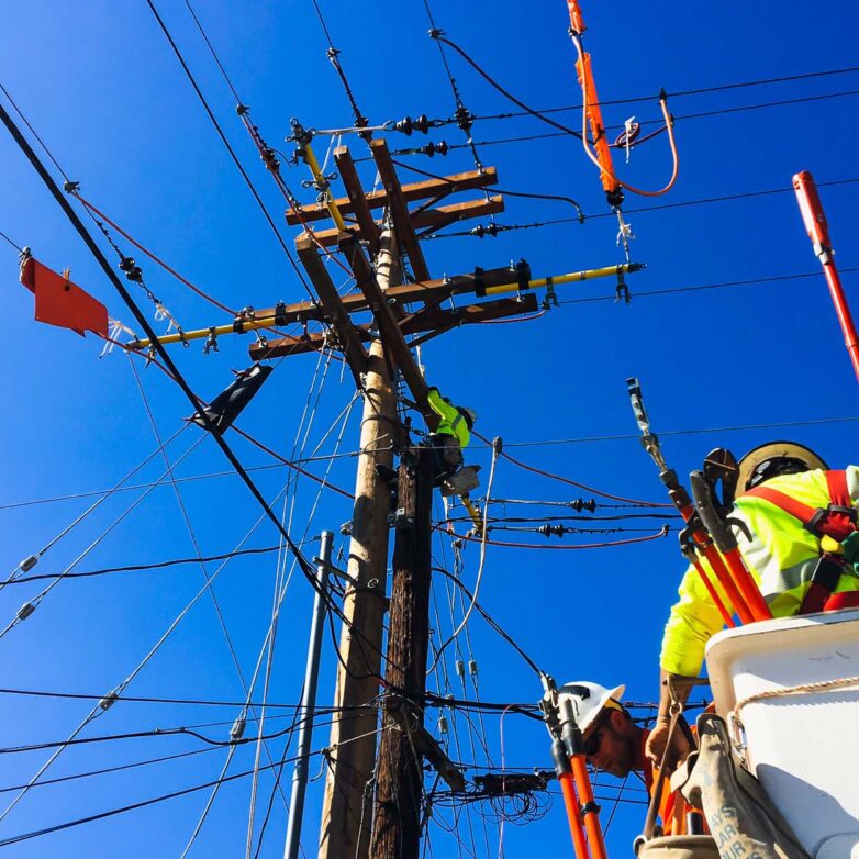 Construction workers working on a power line