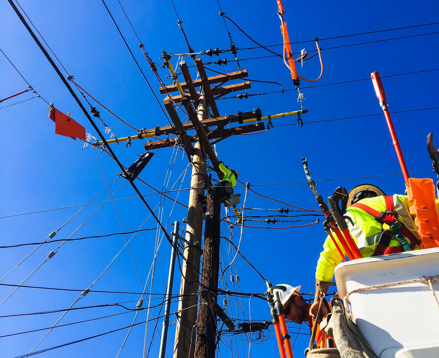 Construction workers working on a power line