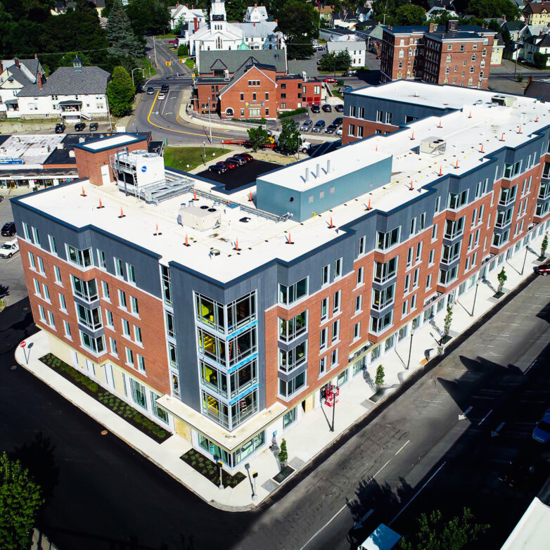 Angled aerial view of the Colby College brick dorms