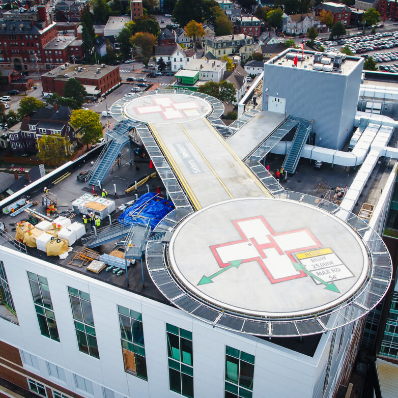Aerial view of the Eastern Maine Medical Center with two helipads on top