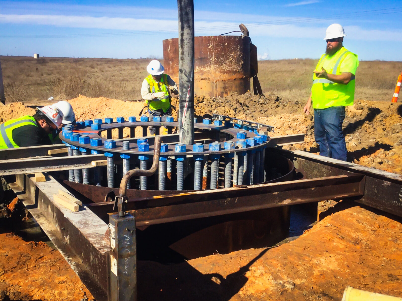 L.E. Myers employees working on transmission pole construction