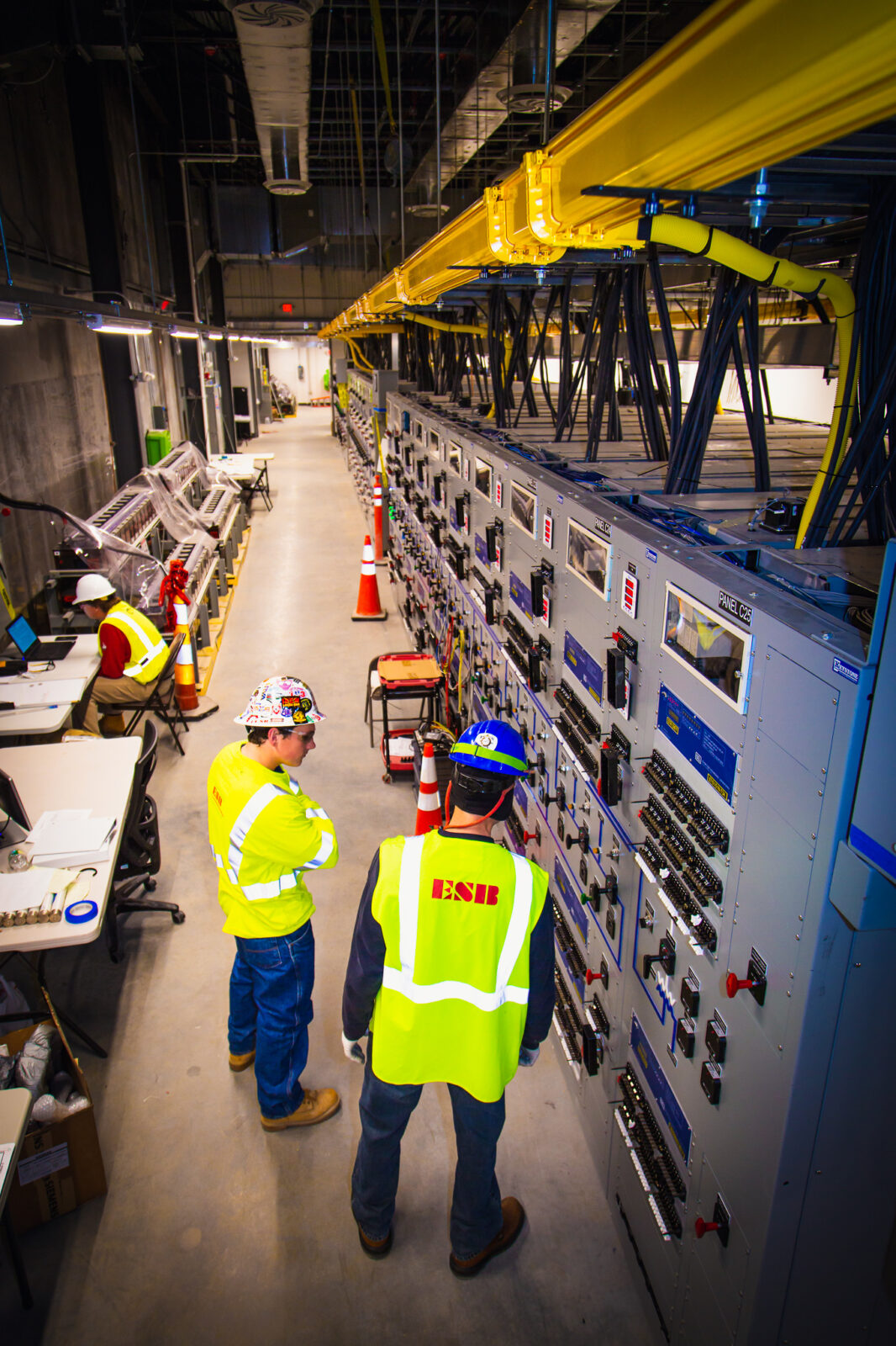ESB workers looking at control panels