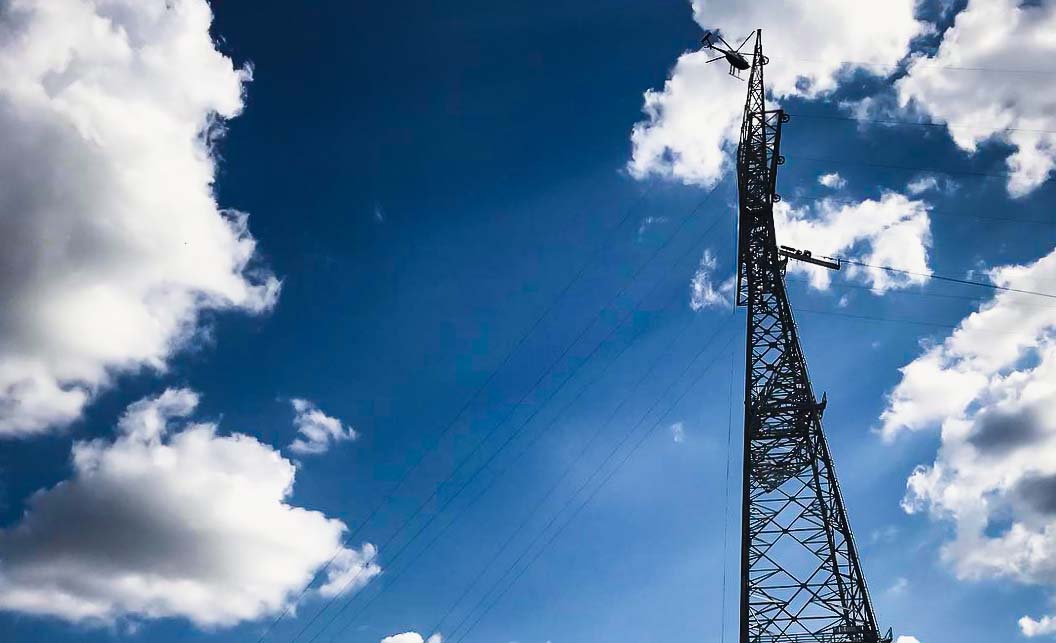 Transmission tower on a cloudy day
