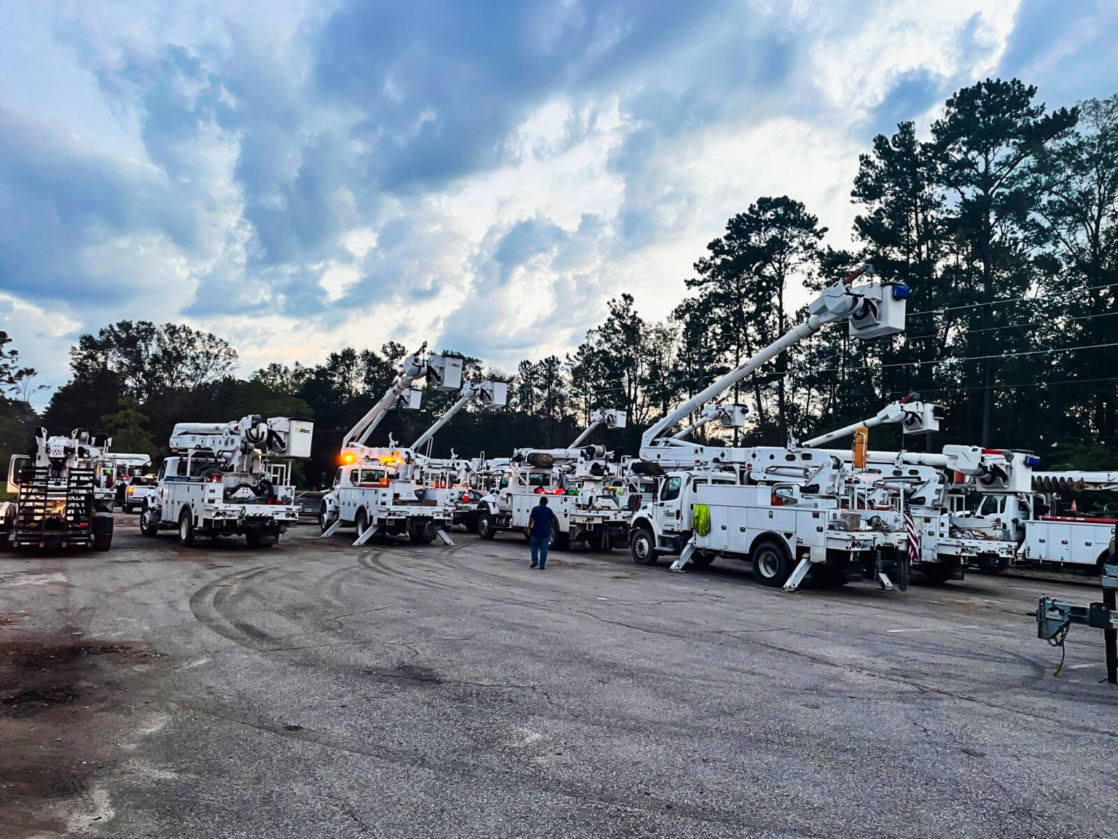 Fleet of white bucket trucks