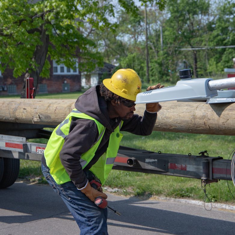 A pre-apprentice working on a streetlighting crew